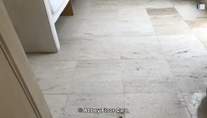 Ceramic Tiles: Intact ceramic floor tiles in a London home that look visually tired despite no cracks, chips, or surface damage.
