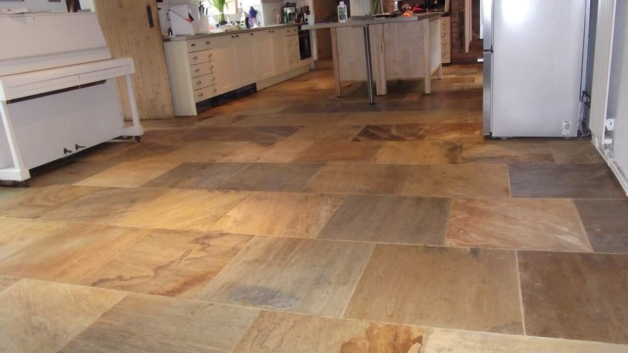 Professionally cleaned sandstone floor with a natural matt finish in a UK home